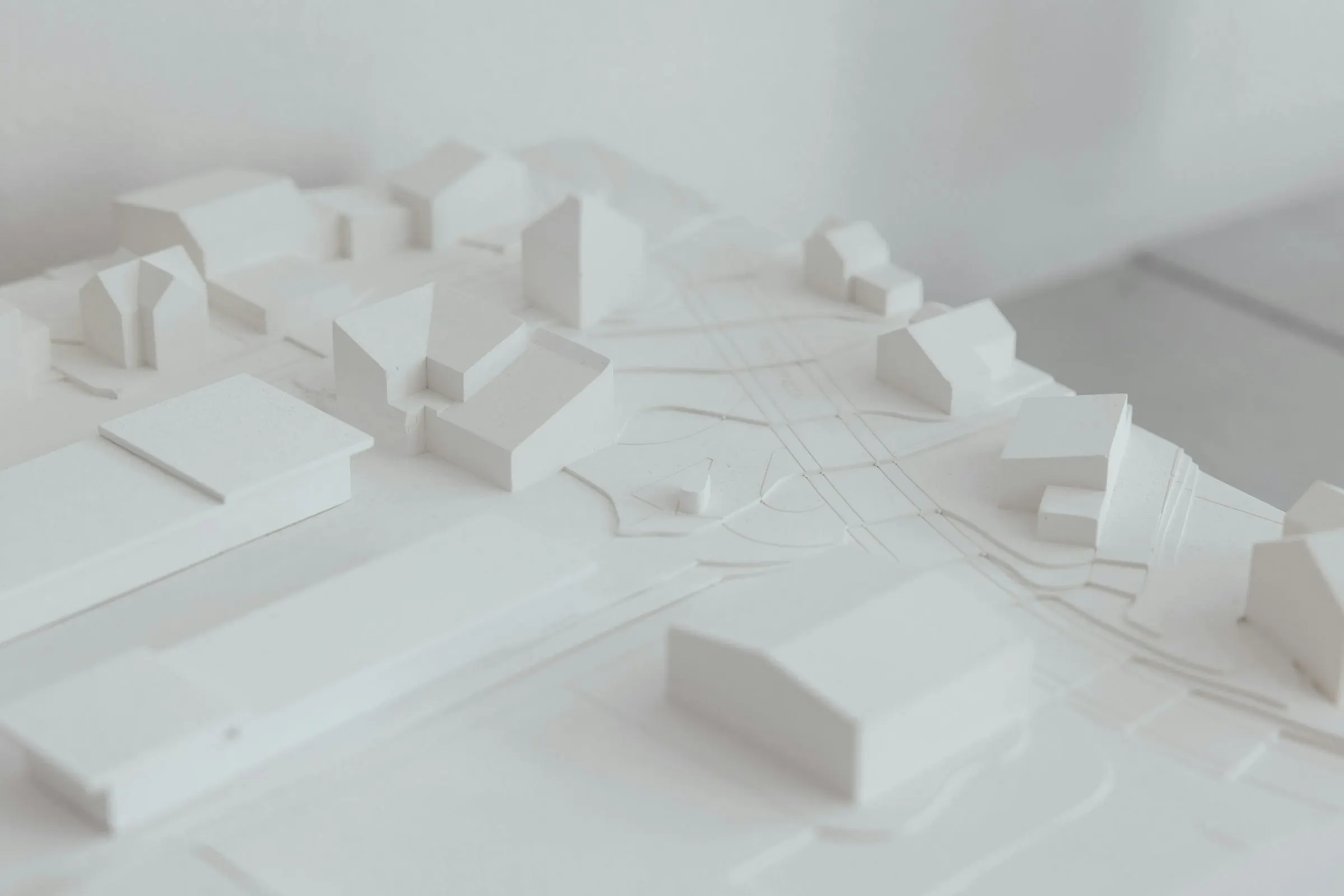 White architectural massing model of a neighbourhood
